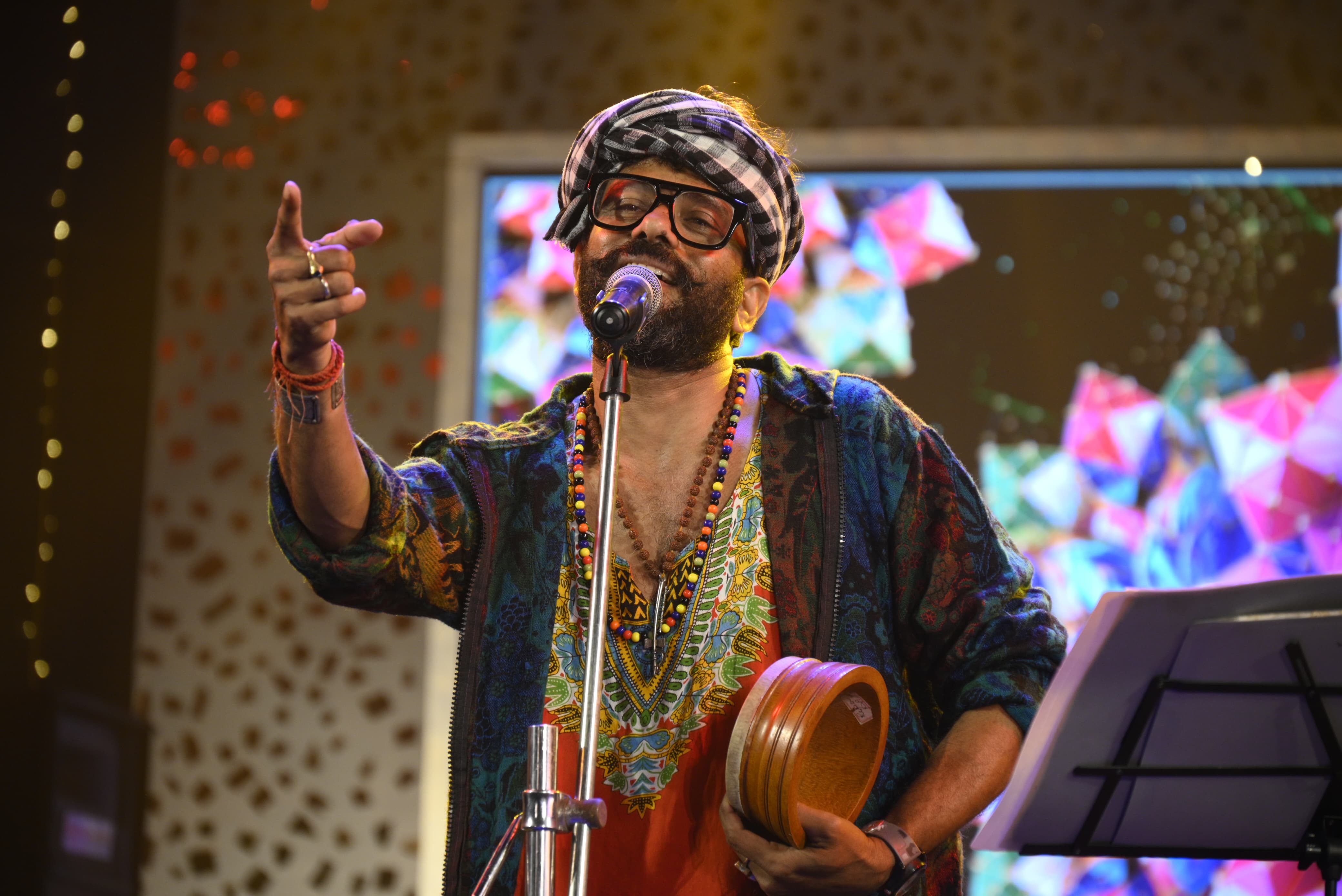Mainak Paladhi singing with traditional Khamak on stage