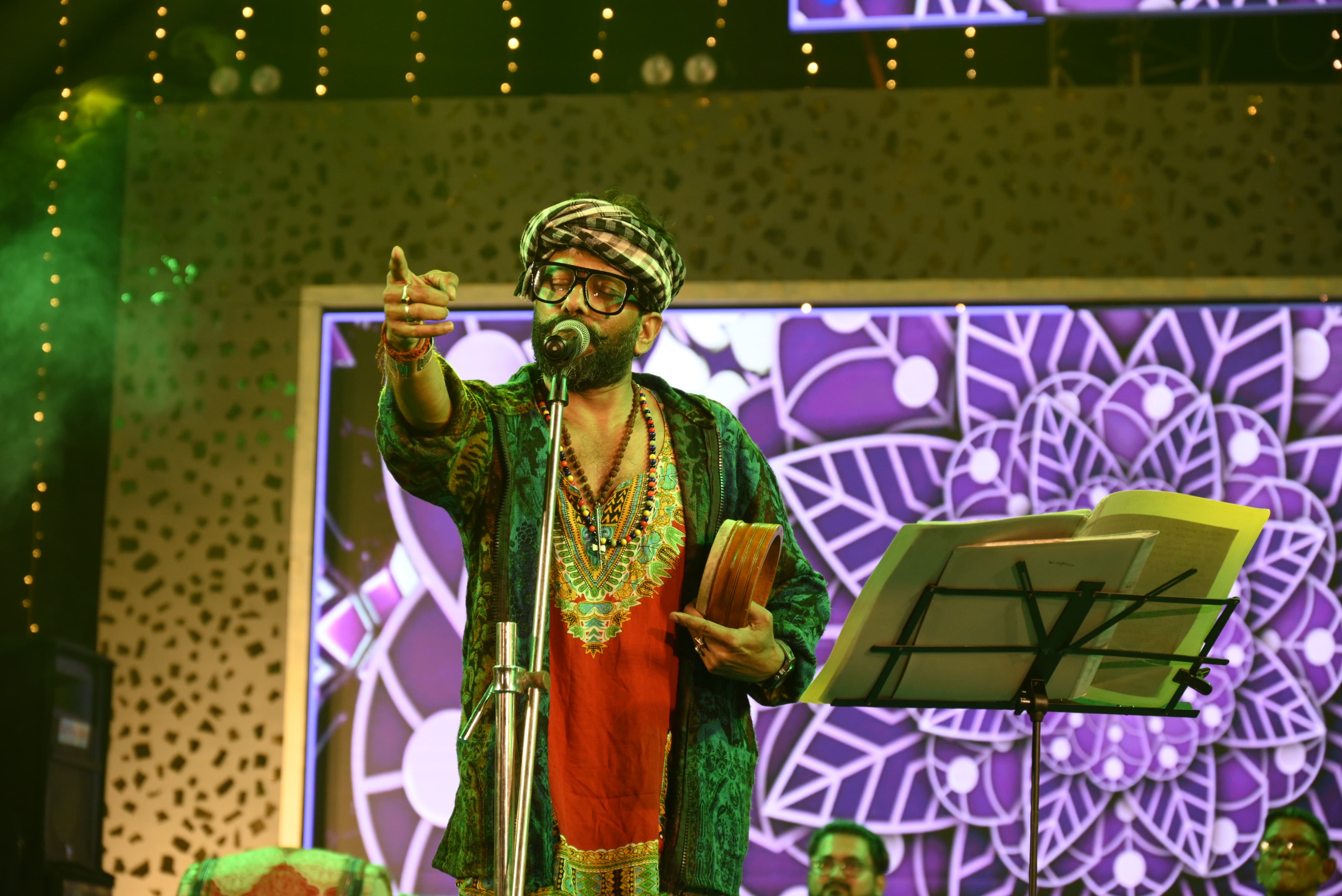 MAINAKER DOLBOL performing before a packed arena crowd